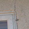 cracked stucco around window frame